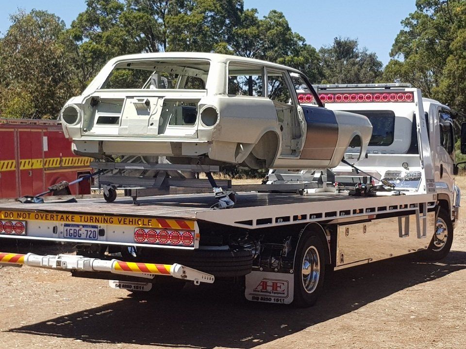 rear view of car on a tow truck for transportation
