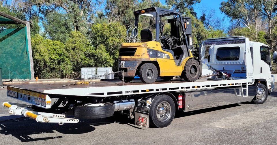 forklift being transported