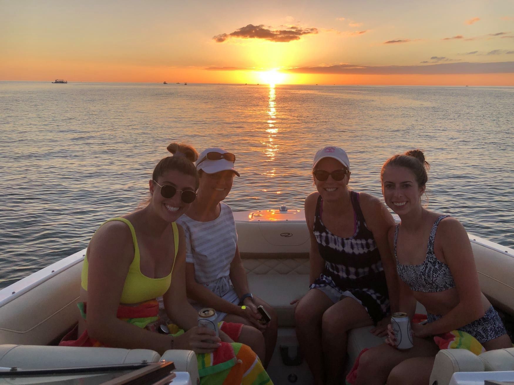 Ladies holding a beer