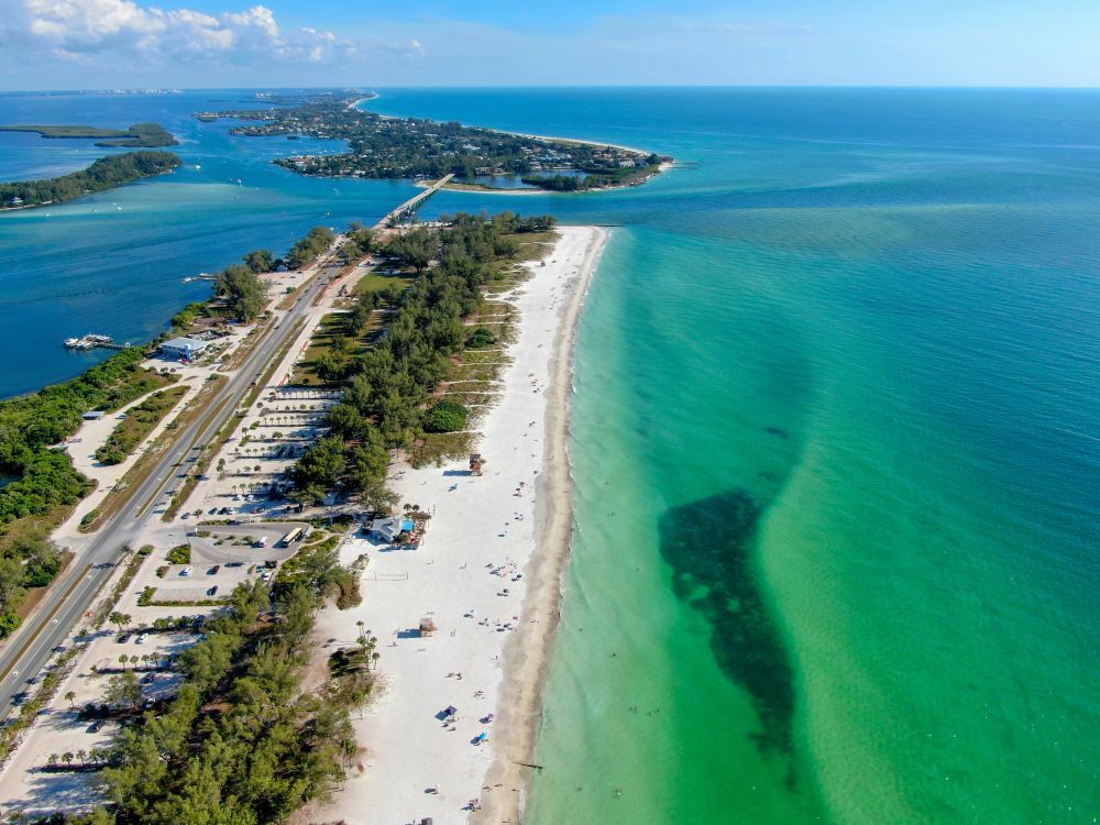 an island with blue waters to the right