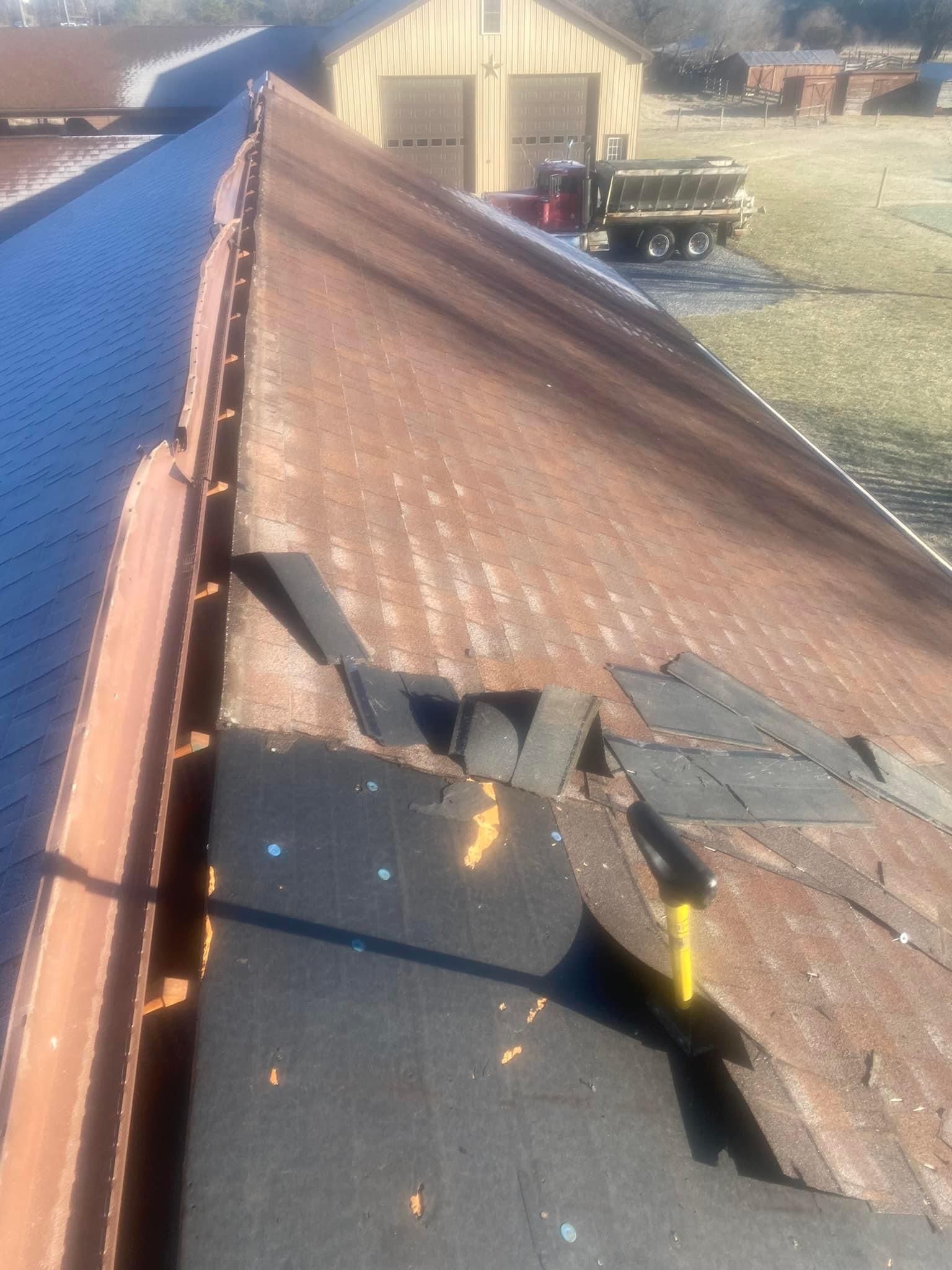 a roof with a lot of shingles missing — KP's Home Repair — McGaheysville, VA