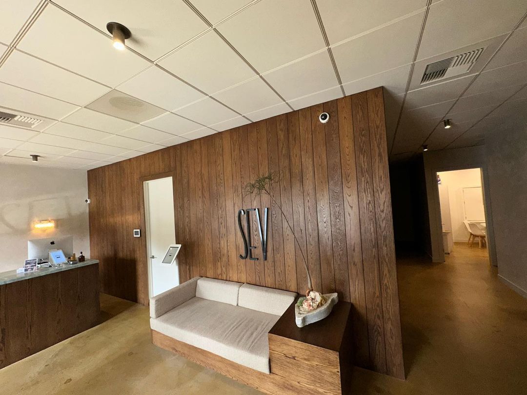 There is a couch in the middle of the room