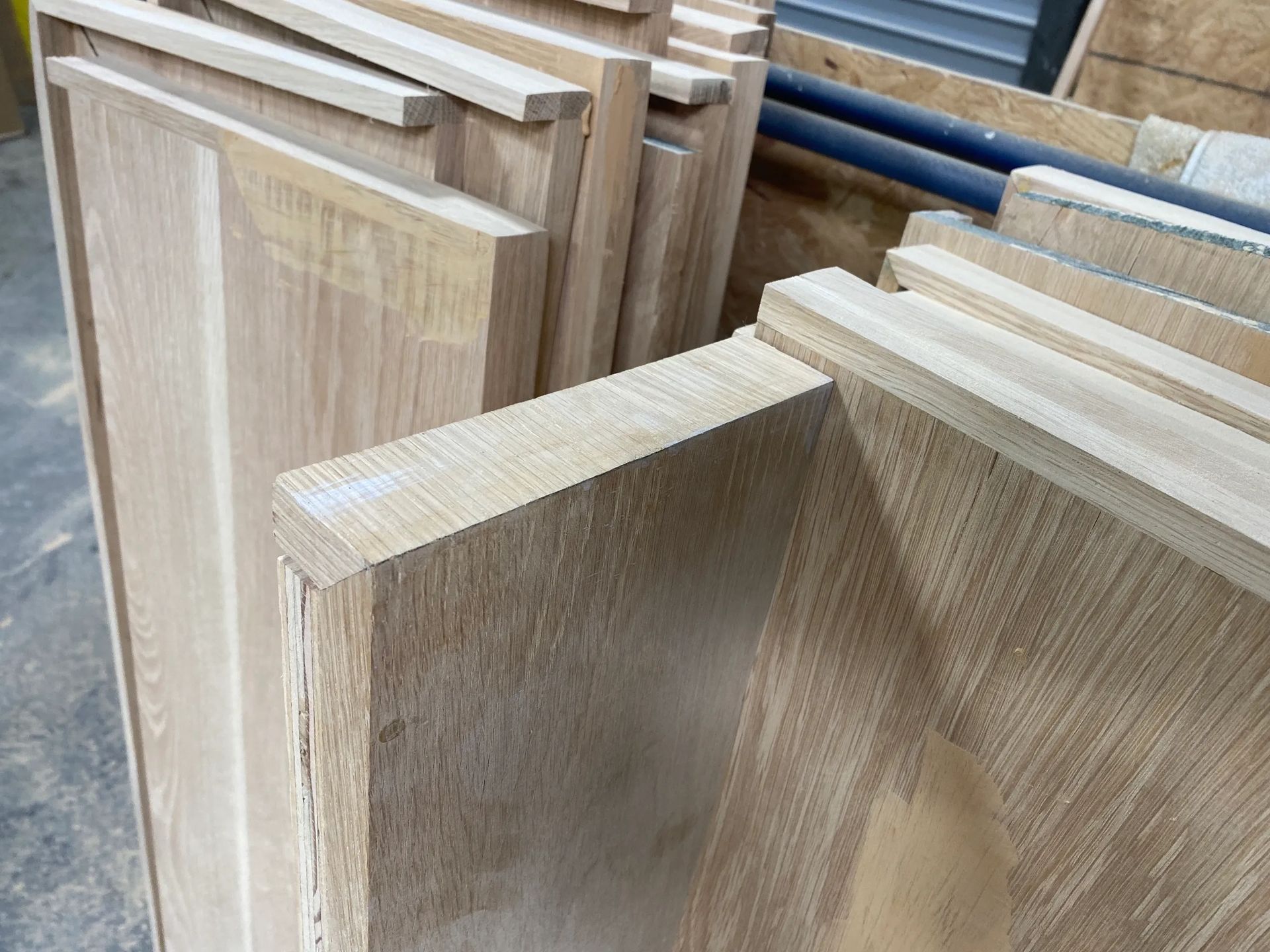 A pile of wood is stacked on top of each other