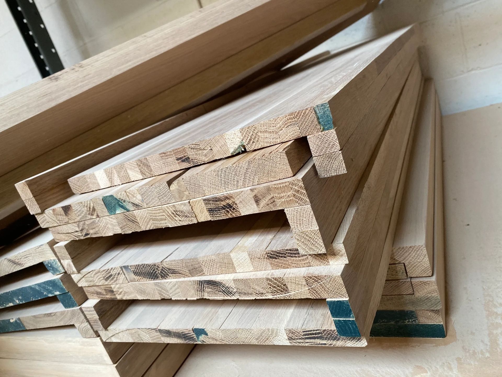 A pile of wood is stacked on top of each other