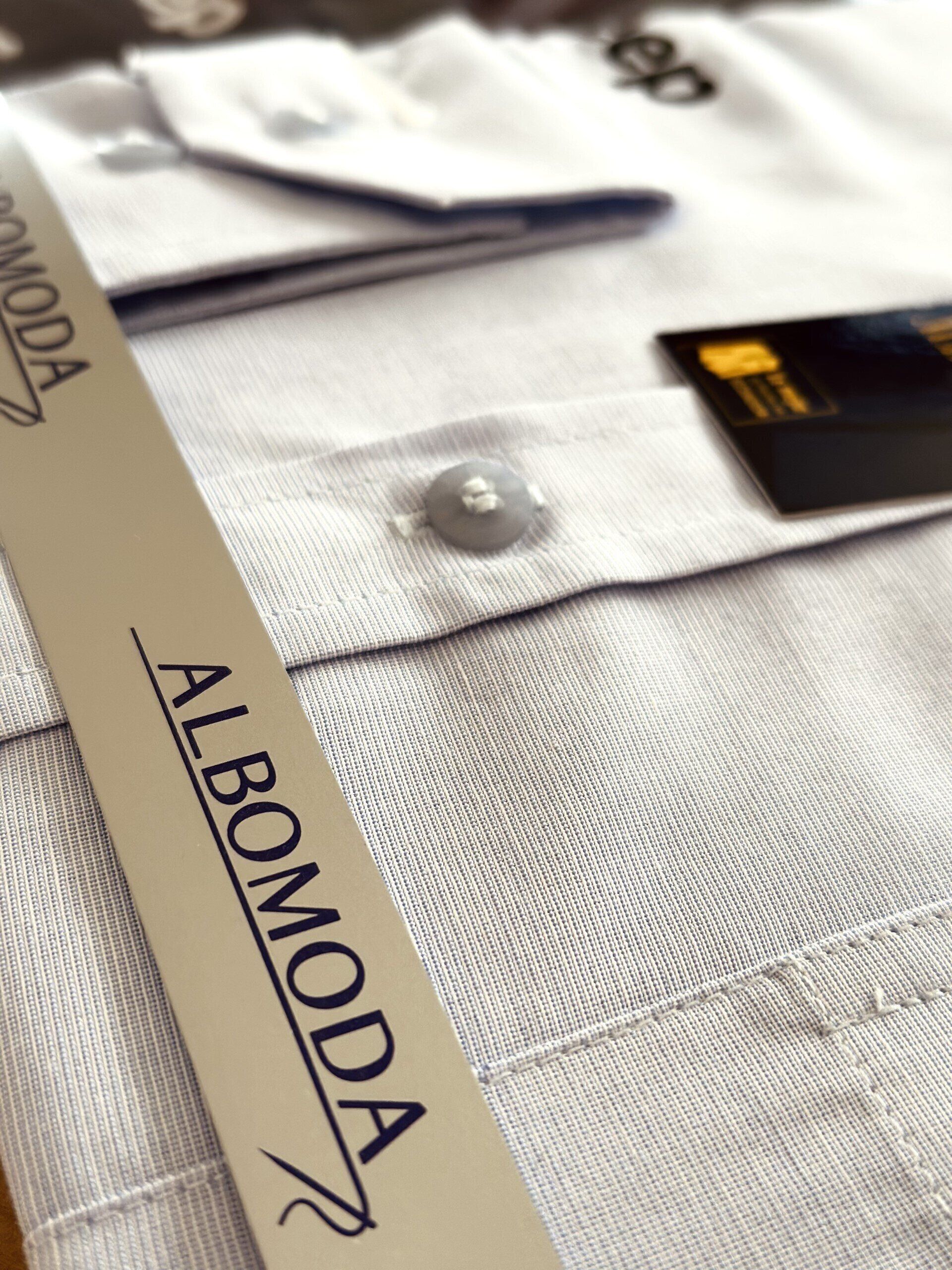 Albomoda & Fill En Blanc, diseño y confección de uniformes corporativos y trajes para damas y caballeros