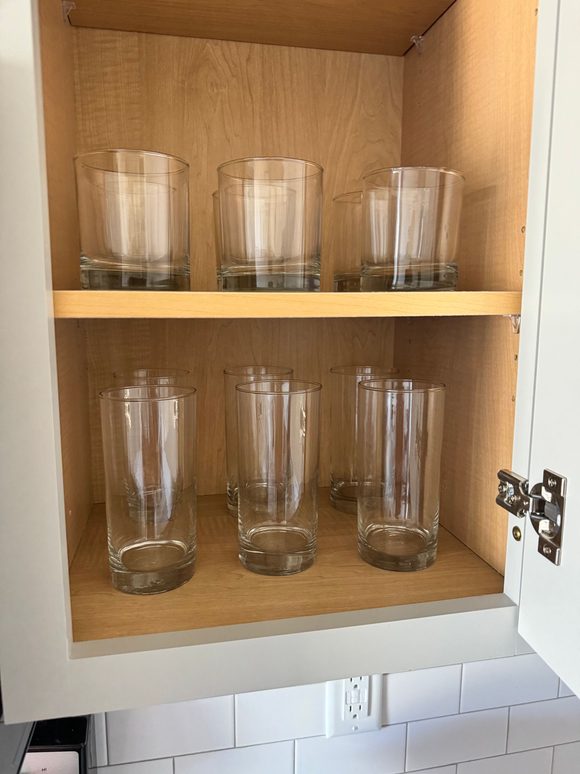 Photo of glassware in a cabinet