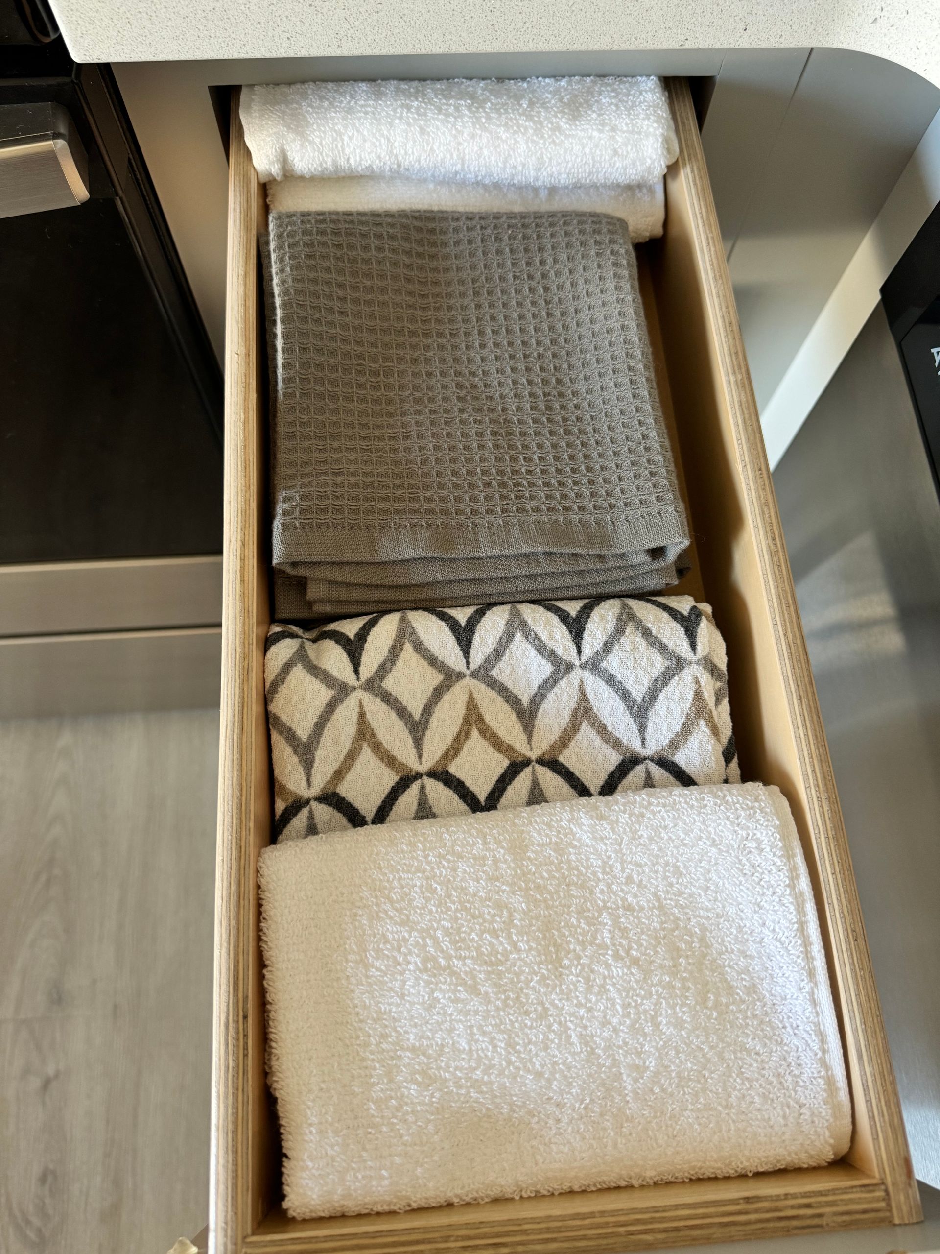 Photo of kitchen towels in a drawer