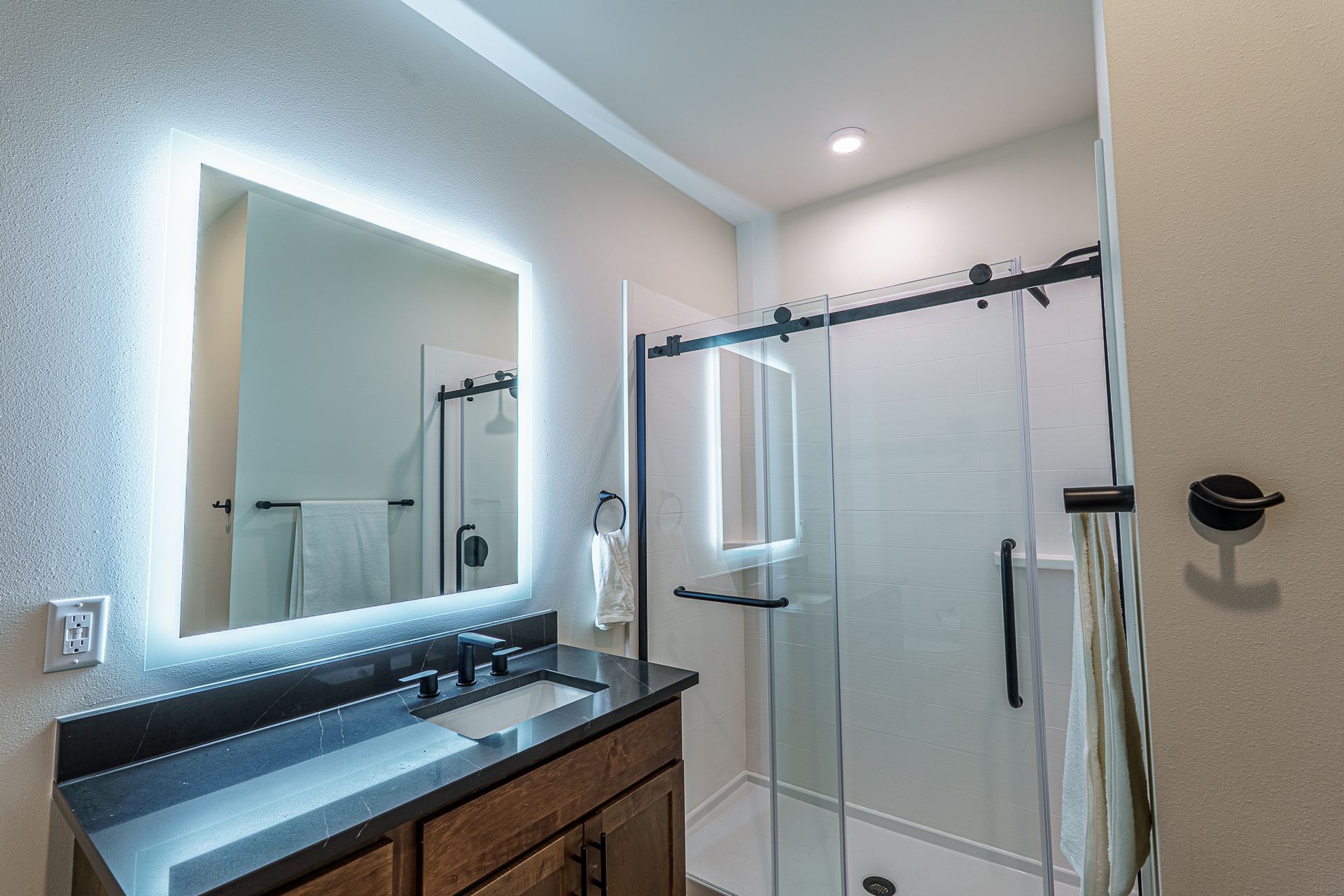 Photo of a bathroom with a shower stall