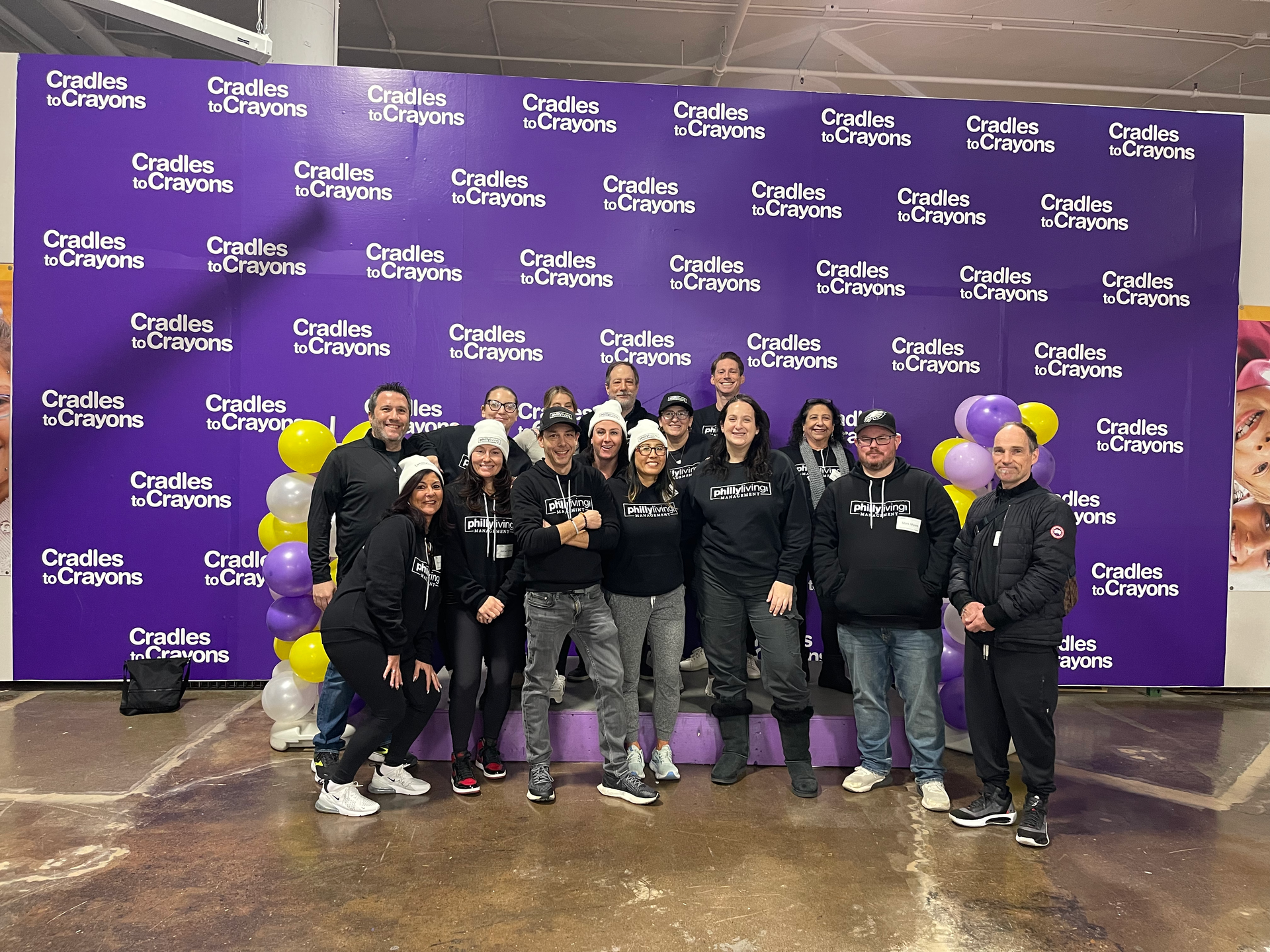 PhillyLiving Management team at Cradles to Crayons The Giving Factory event