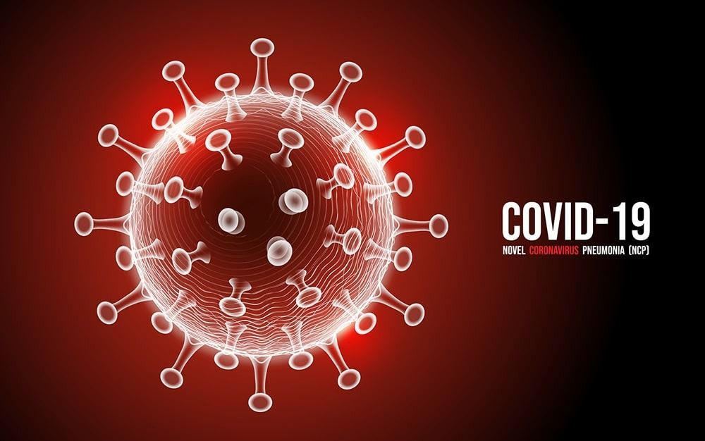 A Close Up of a Covid-19 Virus on a Red Background — New Horizons Dental in Port Douglas, QLD