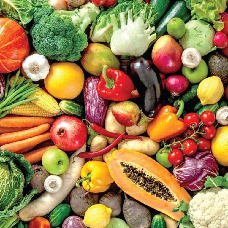 A Pile of Fruits and Vegetables Including Papaya — New Horizons Dental in Port Douglas, QLD