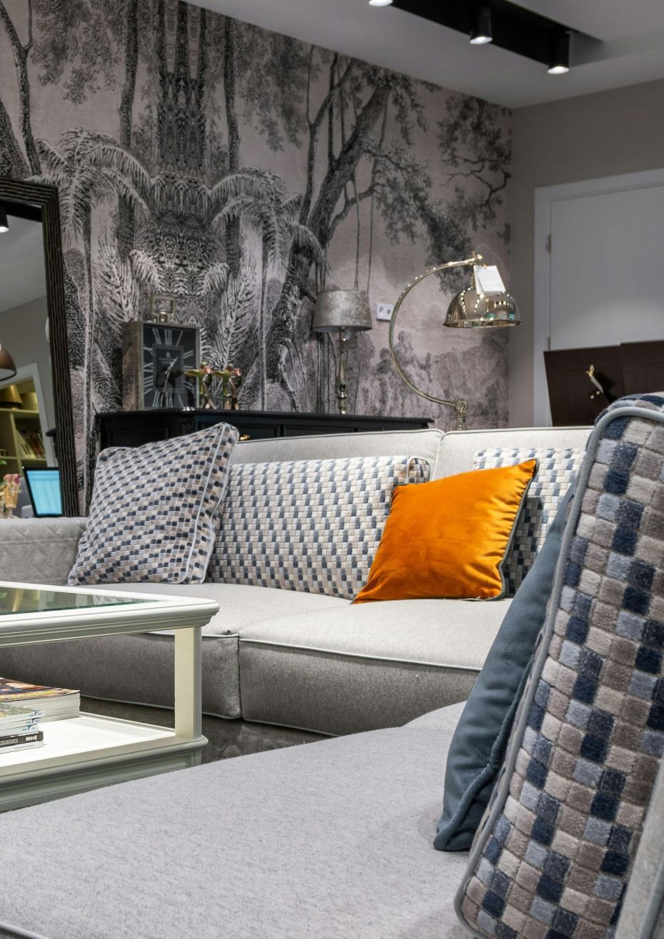 A living room with a couch and a coffee table