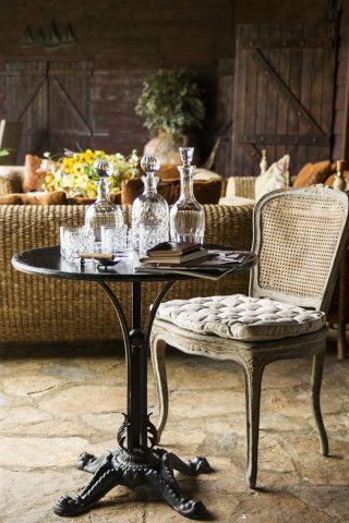 Atmospheric dining space with religious elements and outdoor area