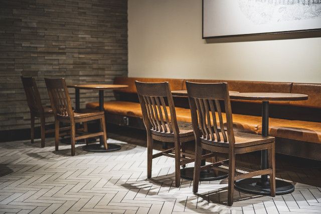 Multi-purpose dining space with outdoor seating and reading area