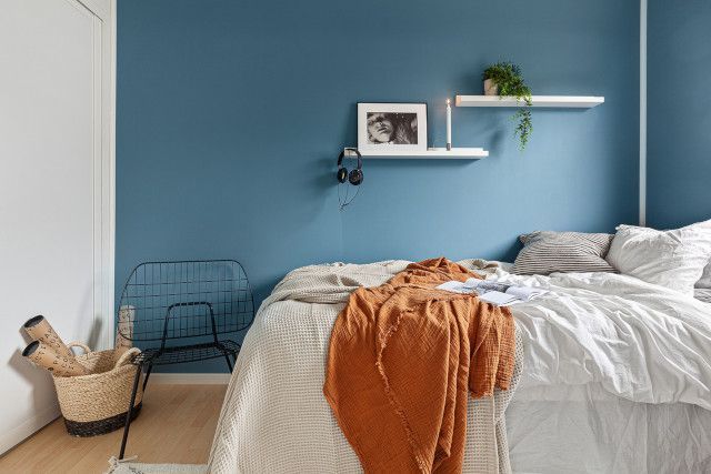 Bedroom setup with comfortable seating and linens