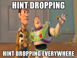 Buzz Lightyear gestures expansively while Woody looks on with a concerned expression.