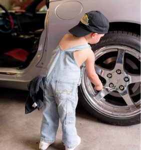 Kid Change Tires at Coastal Automotive - Pascagoula Auto Repair