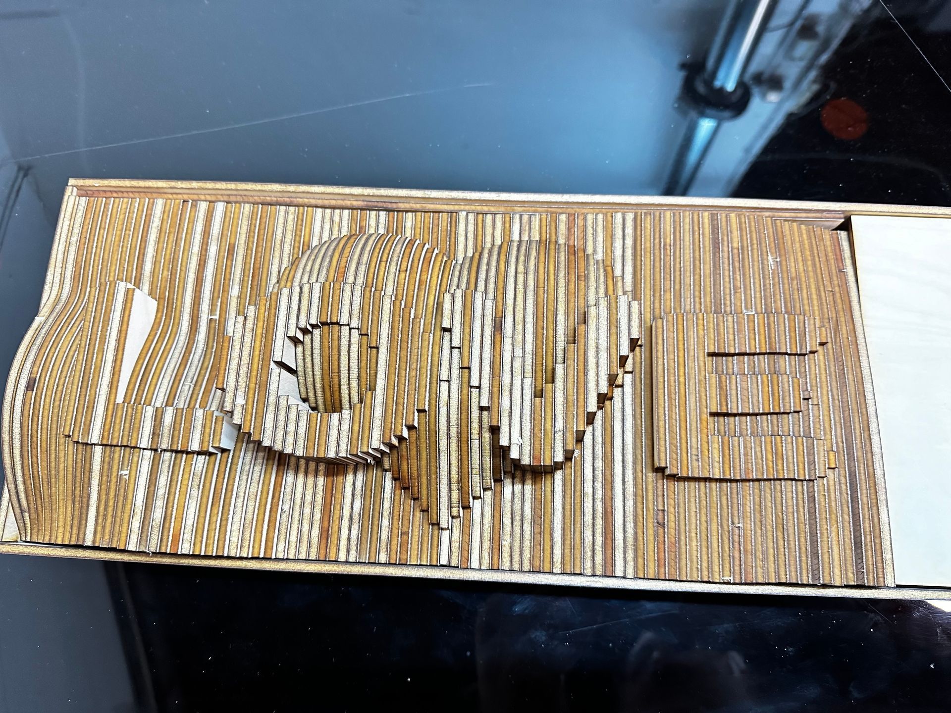 A piece of cardboard with the word love on it