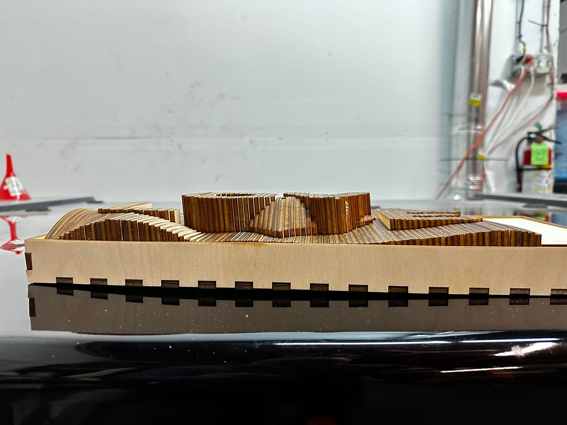 A piece of wood is sitting on top of a table