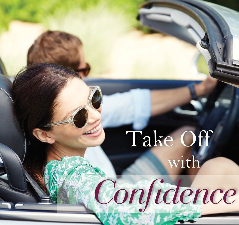 A woman wearing sunglasses is sitting in a car with the words take off with confidence below her