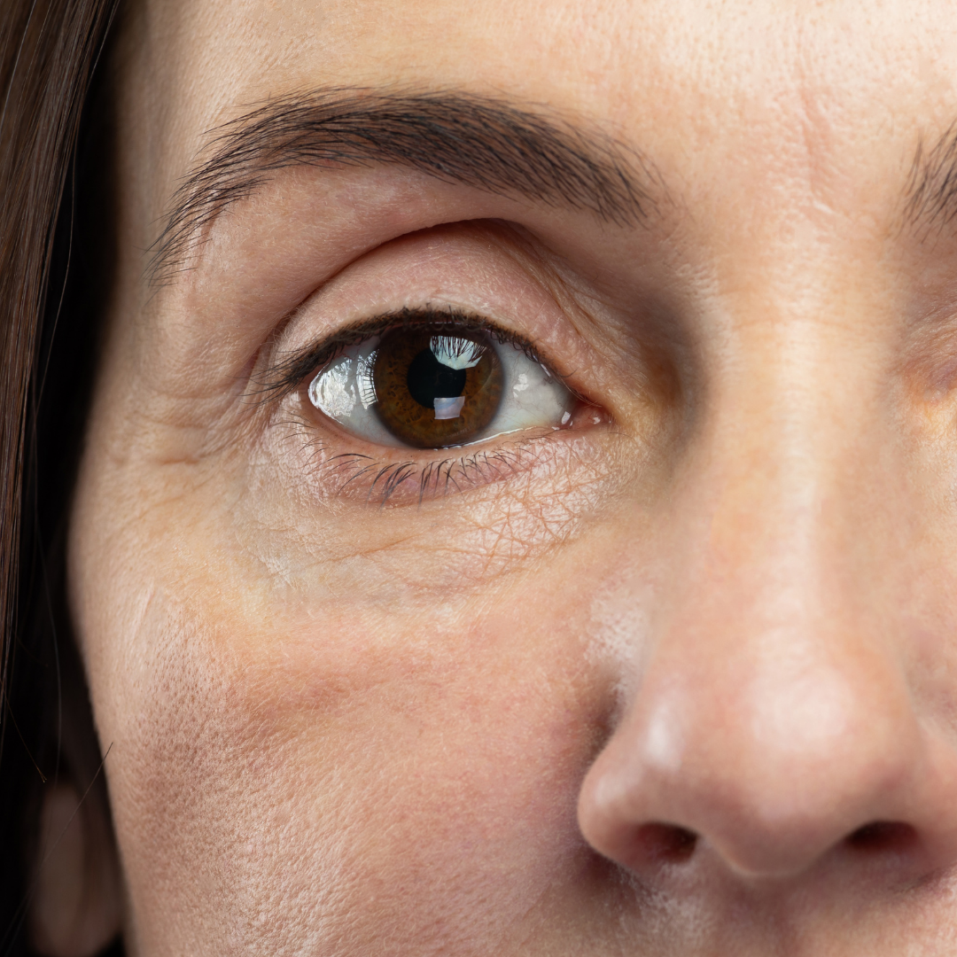 Two women, close-up shots. One looking up. The other's focus is on the lips.