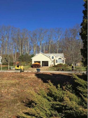 Auburn New Driveway Install Before - Sealcoating in Worcester, MA