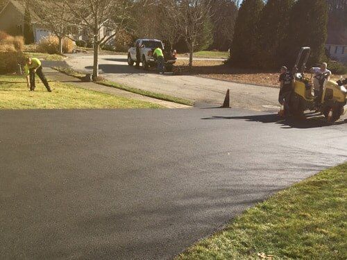 Concrete Road — Construction Workers on Roadin Worcester, MA