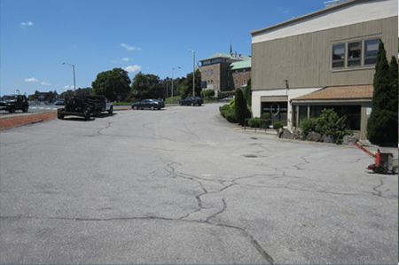 Asphalt Service — Commercial Parking BEFORE  in Worcester, MA