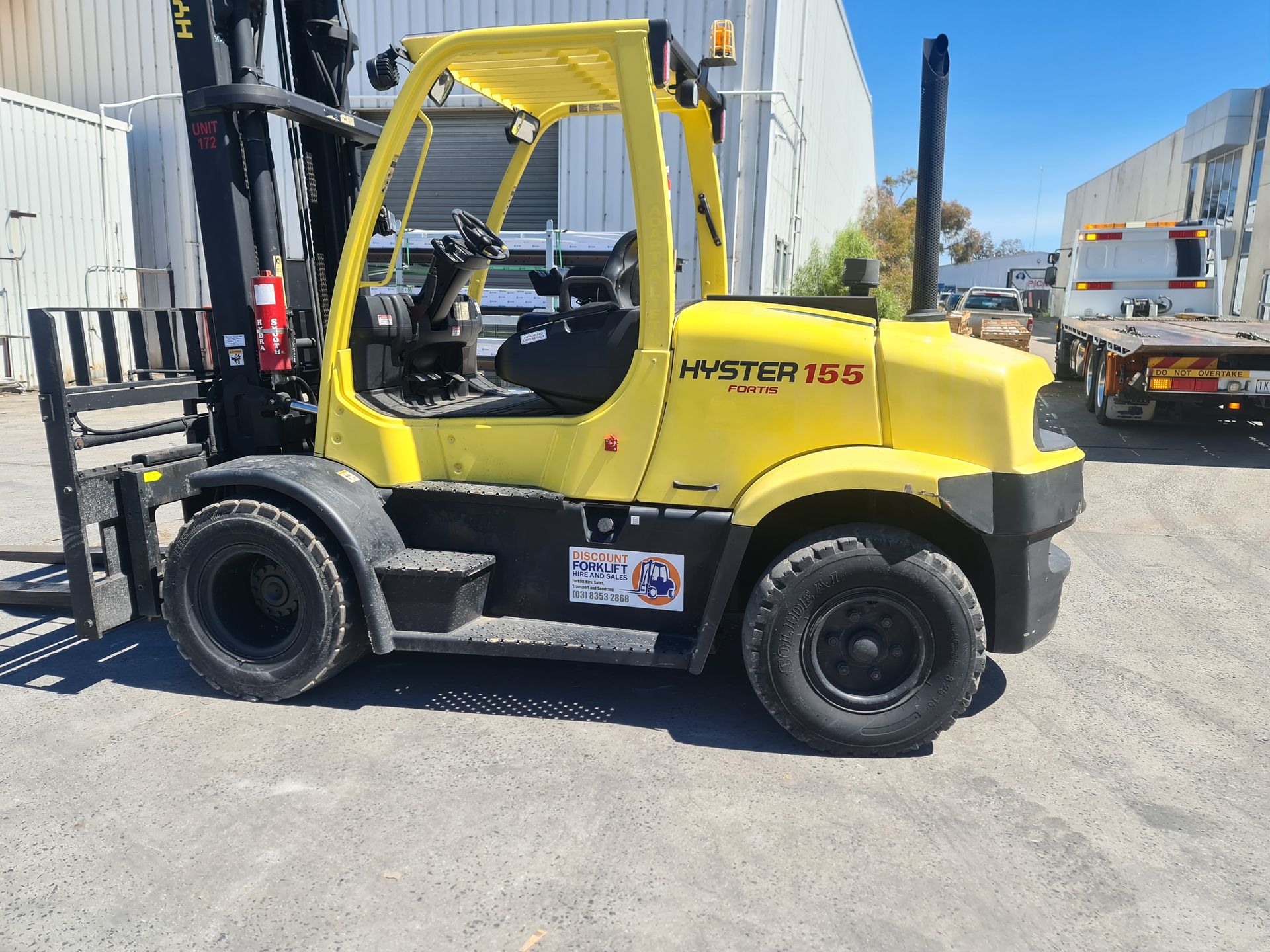 Orange forklift in warehouse | Derrimut, VIC | Discount Forklifts