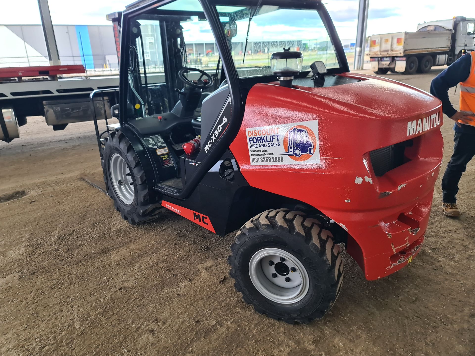 Forklift lifting giant tires | Derrimut, VIC | Discount Forklifts