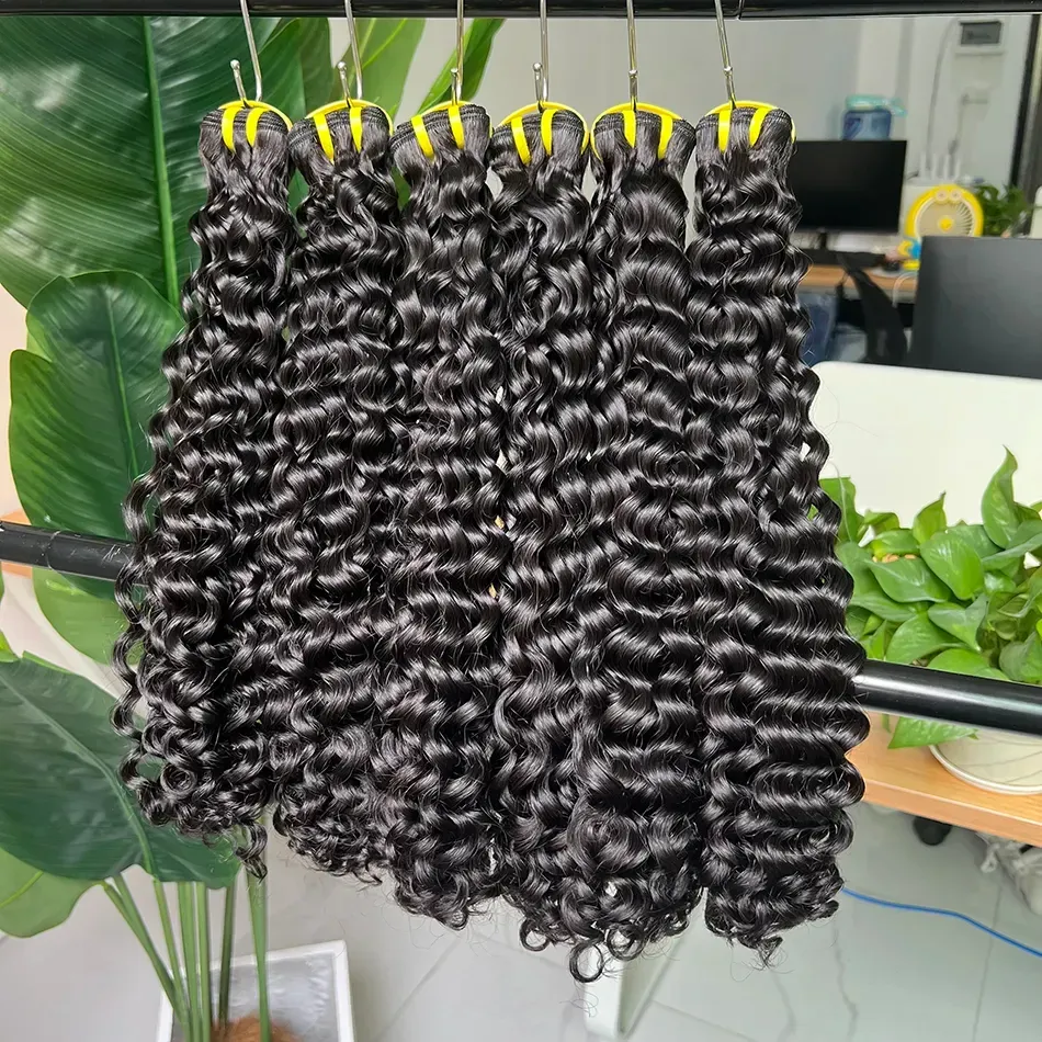alt="Curly virgin hair bundles with defined curls and full volume"