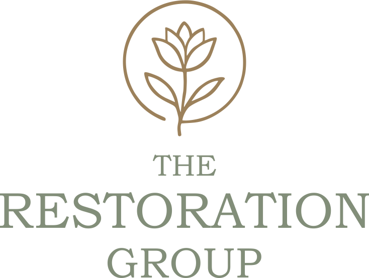 Logo of The Restoration Group: floral design in a circle above the company name in a serif font; earth-toned color scheme.