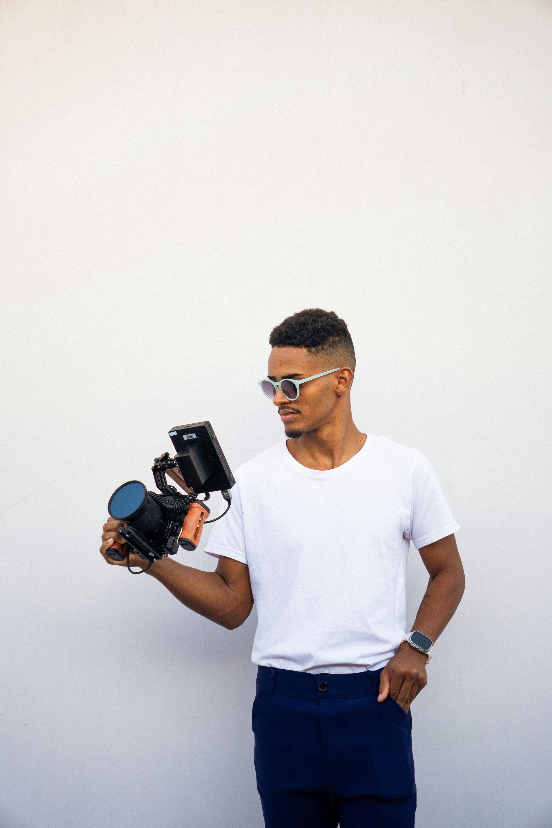 Black man holding a camera