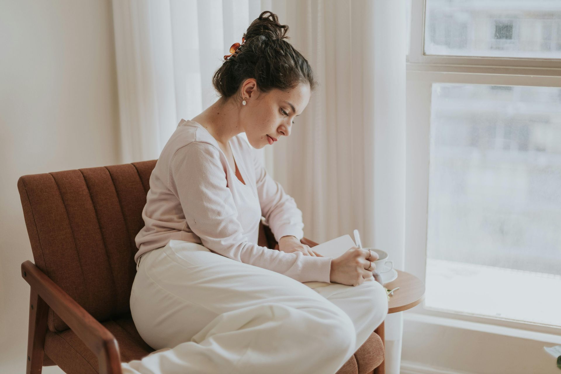 Woman peacefully journaling