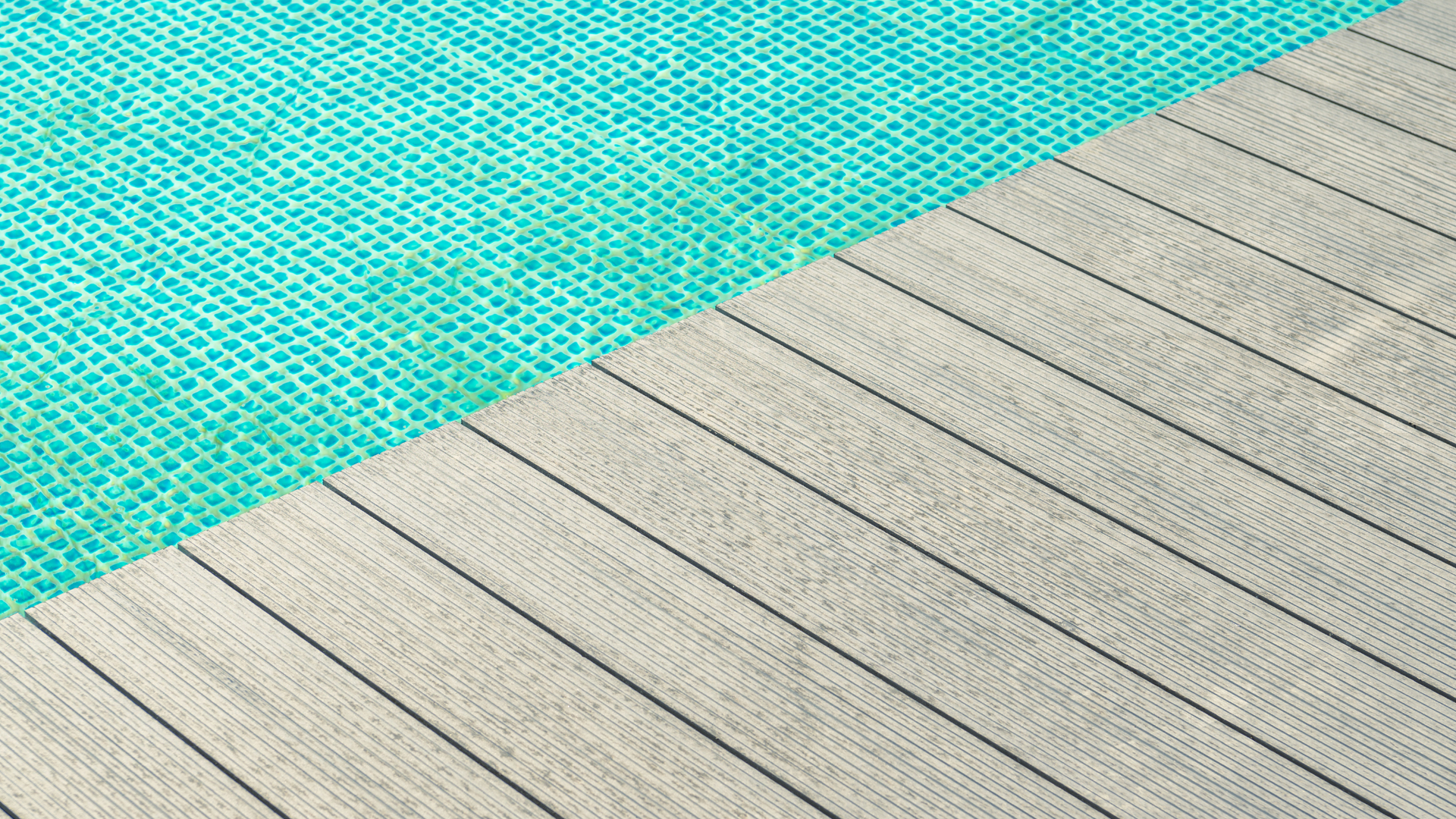 Composite deck featuring a stunning wood pattern, ideal for enhancing outdoor living spaces