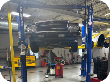 Car Bar Mercedes Benz on Lift | Pete's Service Center