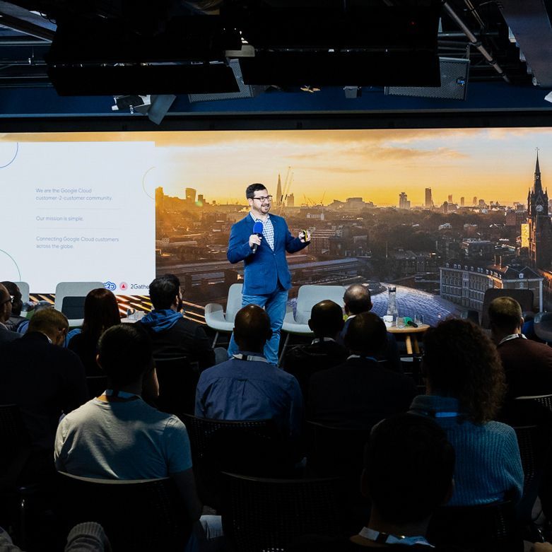 A man is giving a presentation to a group of people