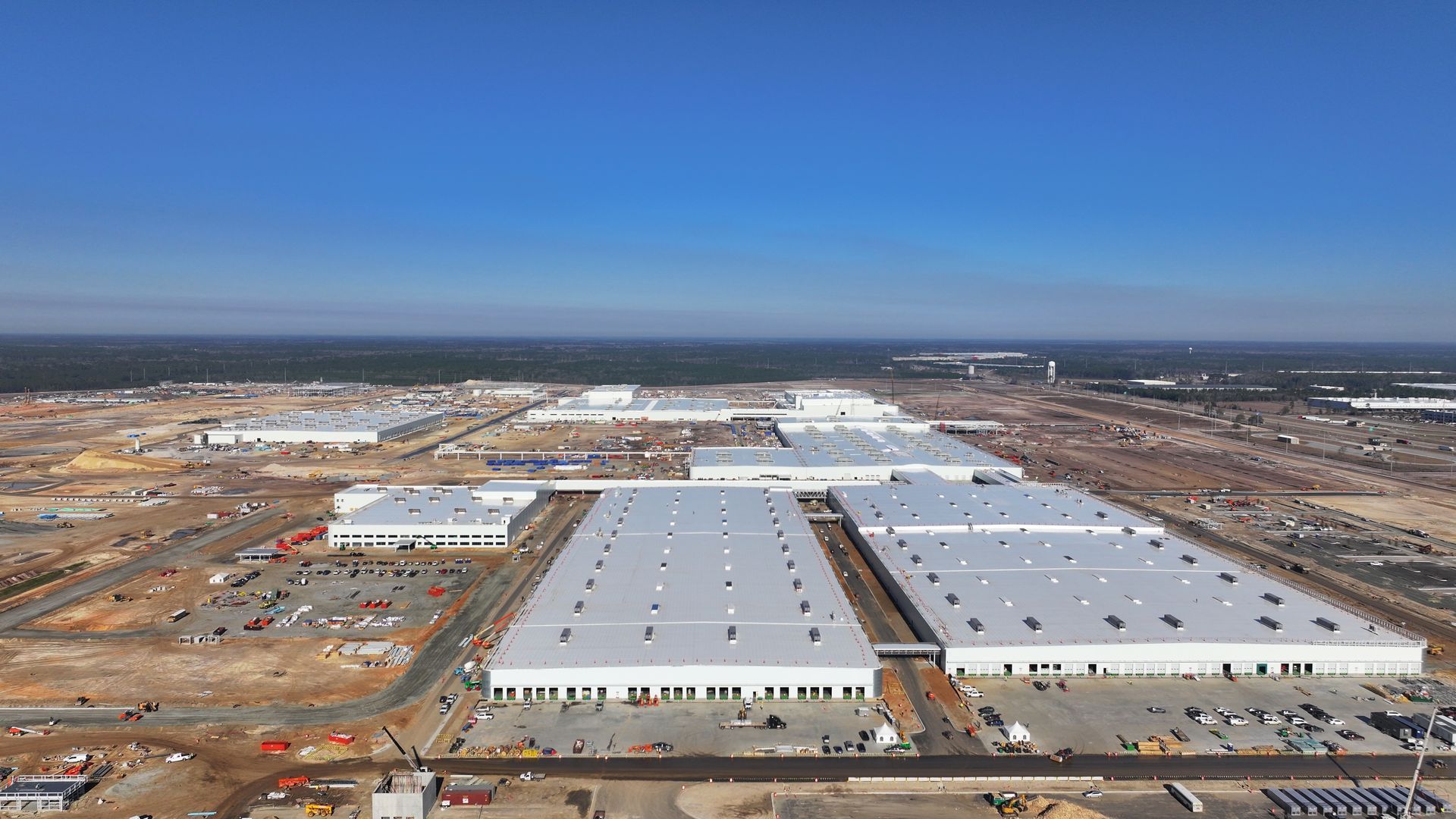 An aerial view of a large industrial area with lots of buildings.