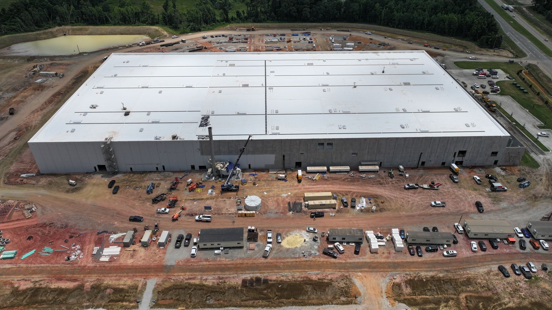 An aerial view of a large building under construction
