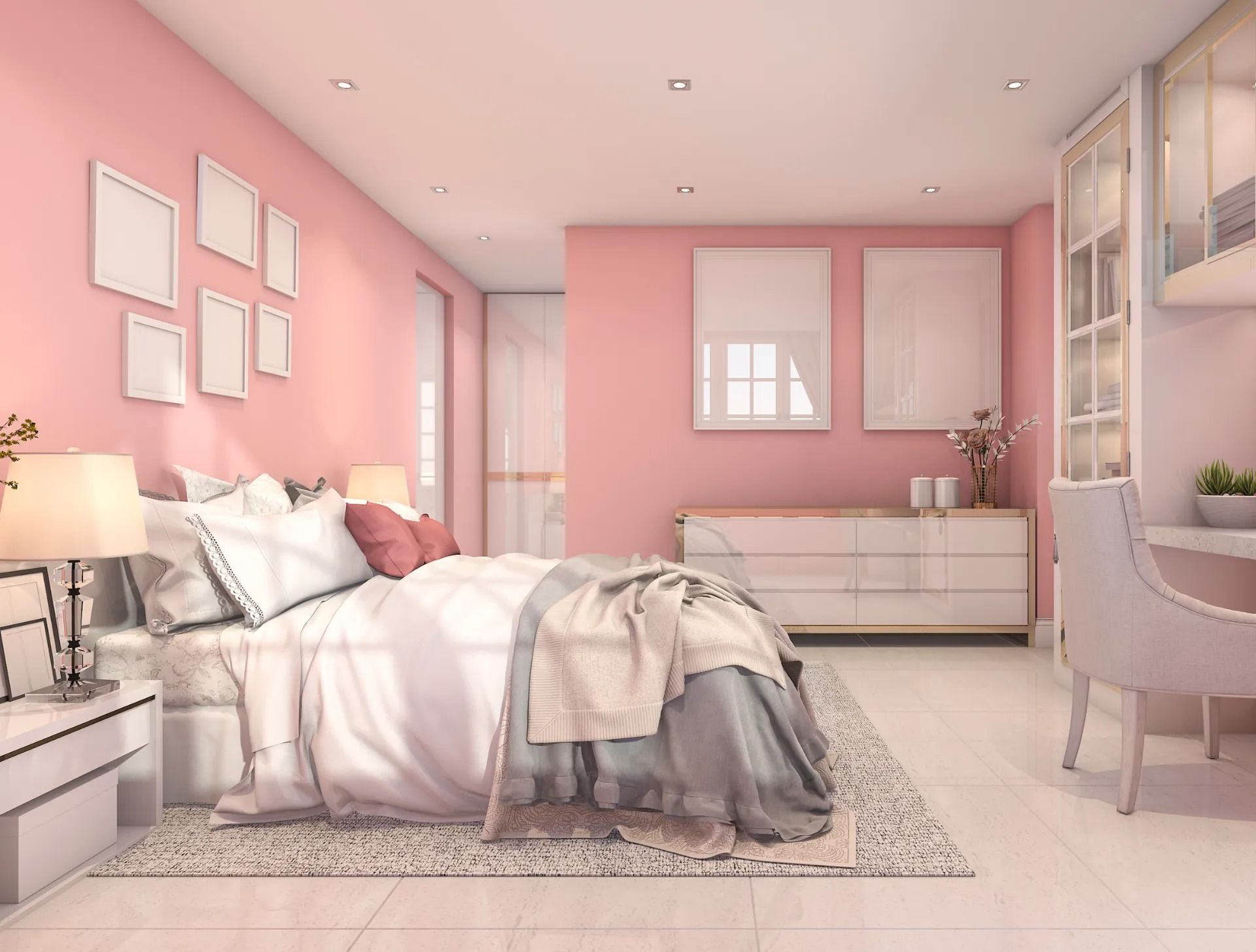 A bedroom with pink walls and a white bed.