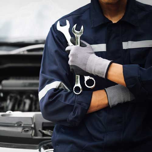 Mechanic Holding Wrenches – Roseville, CA – Auernig Auto Body