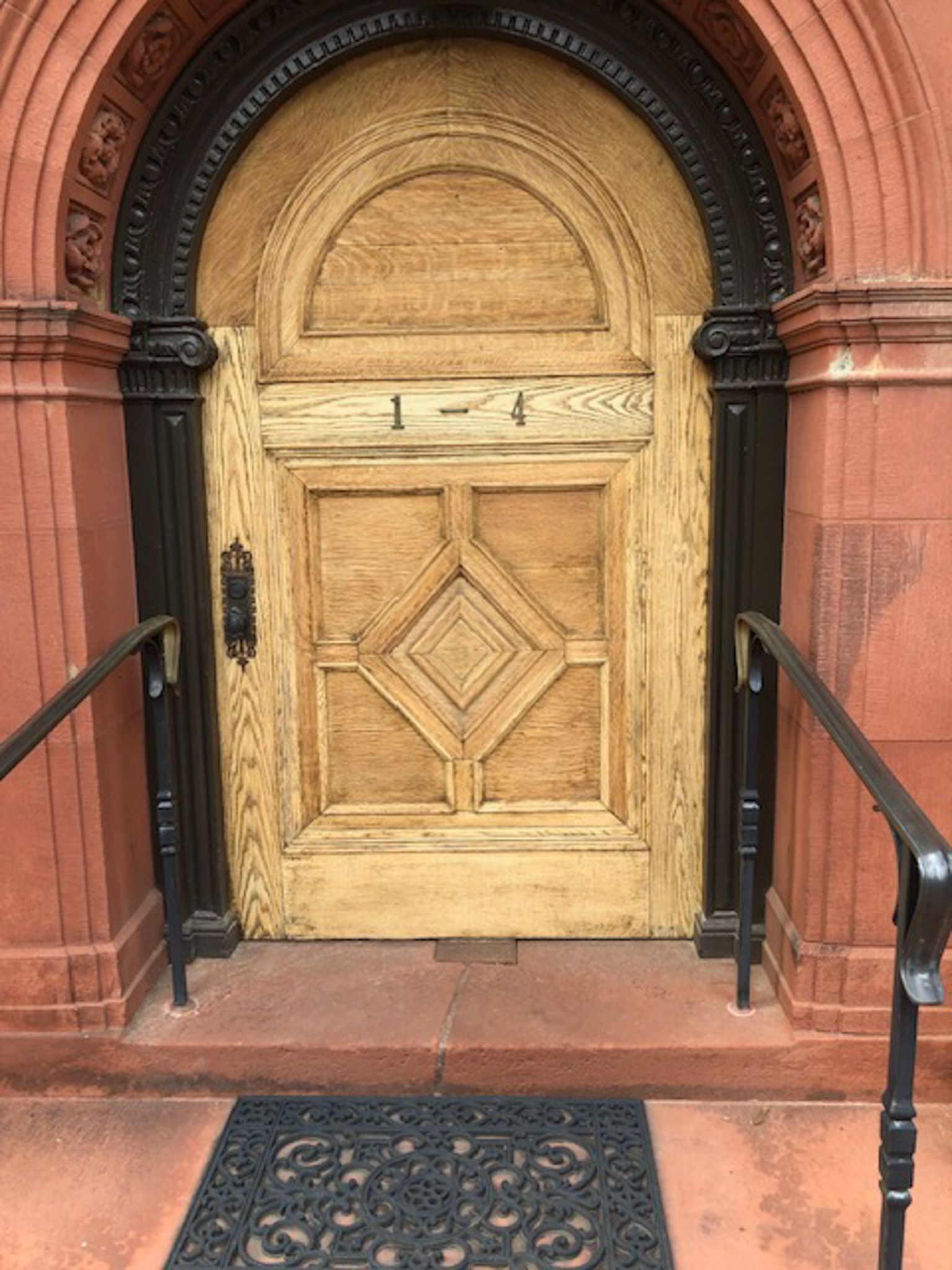 A wooden door with the number 1 on it