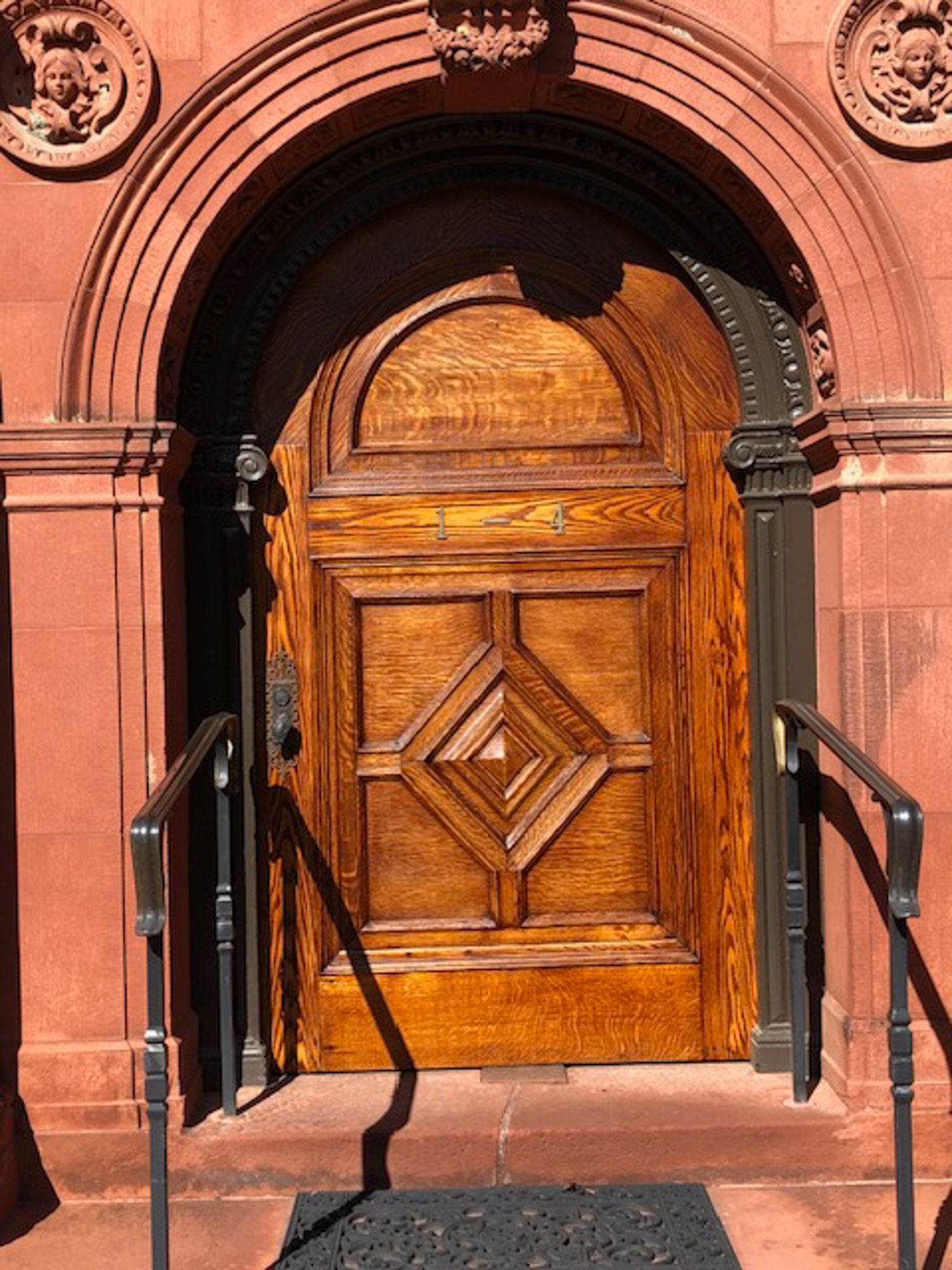 A wooden door with stairs leading up to it