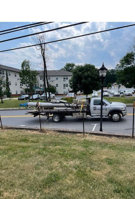Tow Truck carrying materials