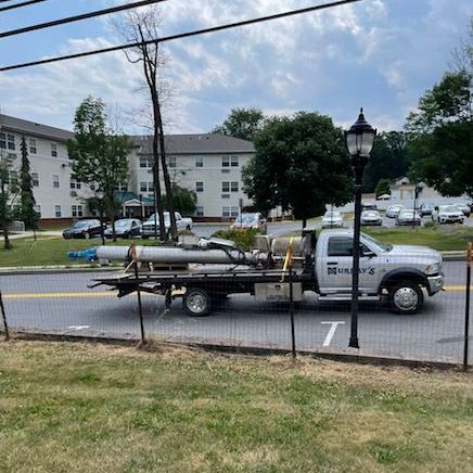 Tow truck driving on road