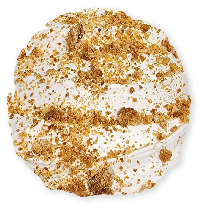 Whipped dessert topped with brown crumbs.