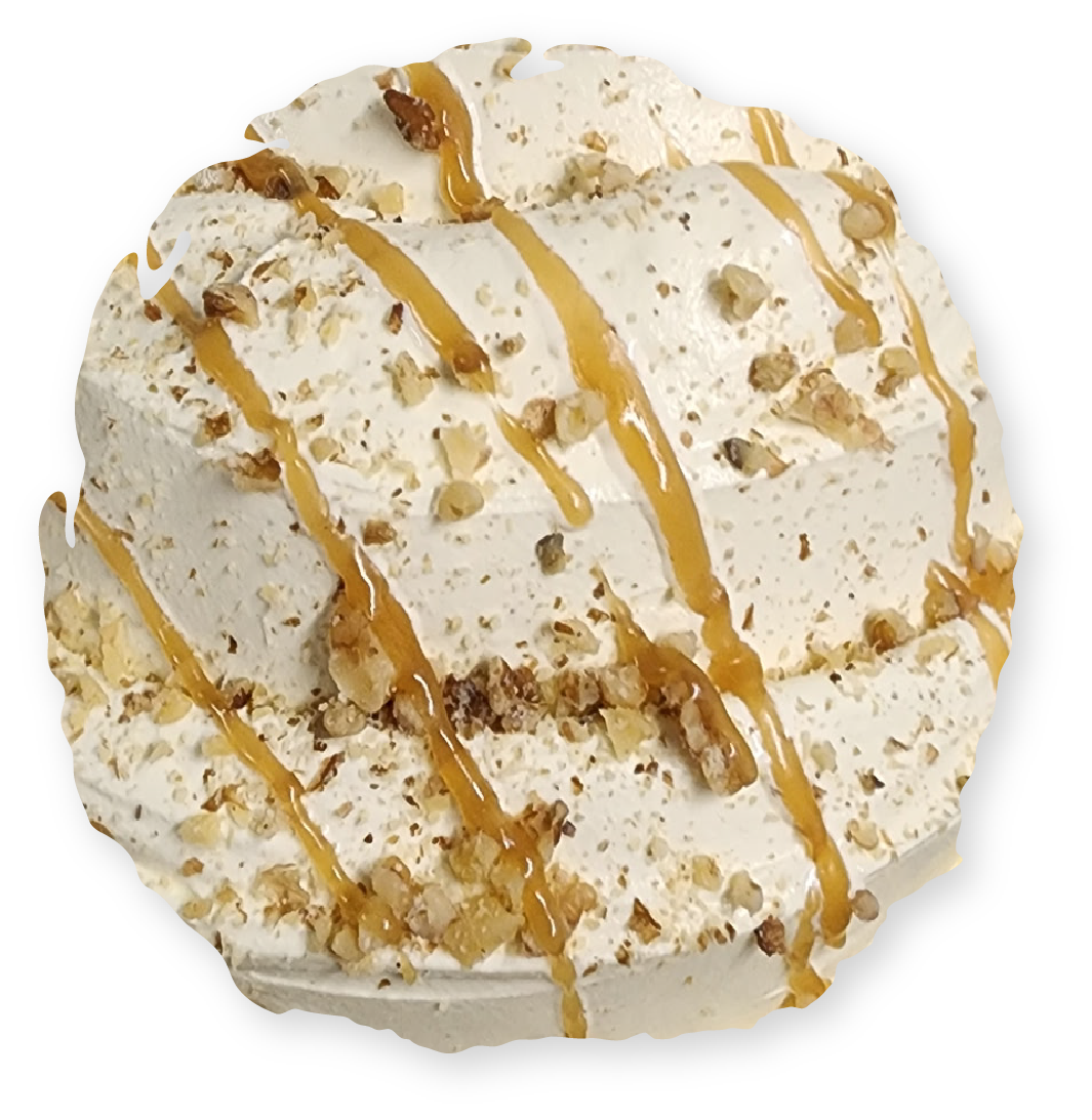 Ice cream cake with caramel drizzle and walnuts.