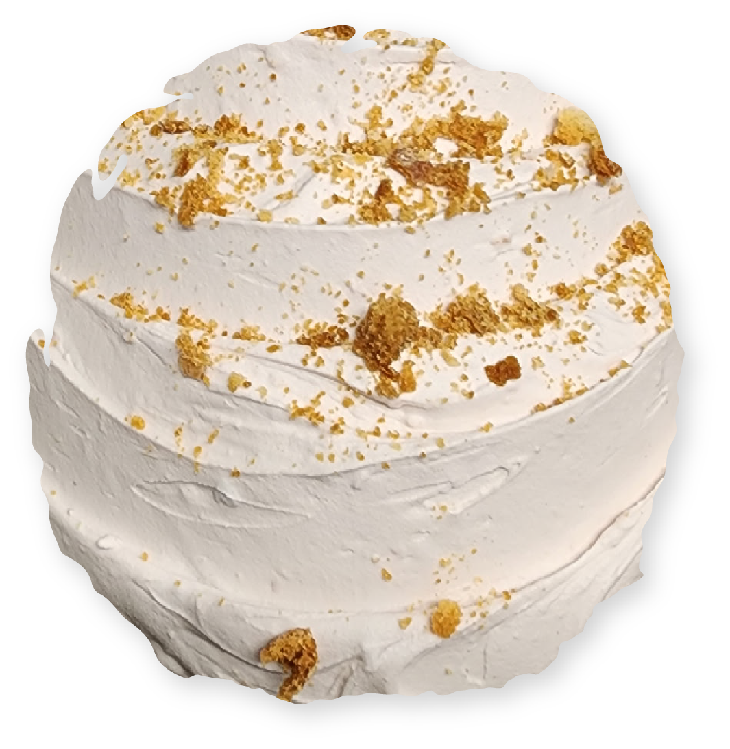 White frosted cake with crumb topping.