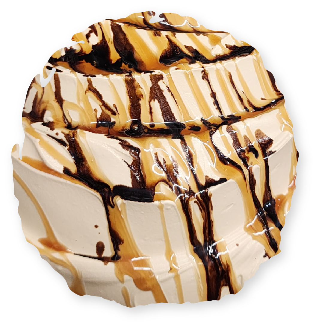 Cinnamon roll drizzled with chocolate and caramel.