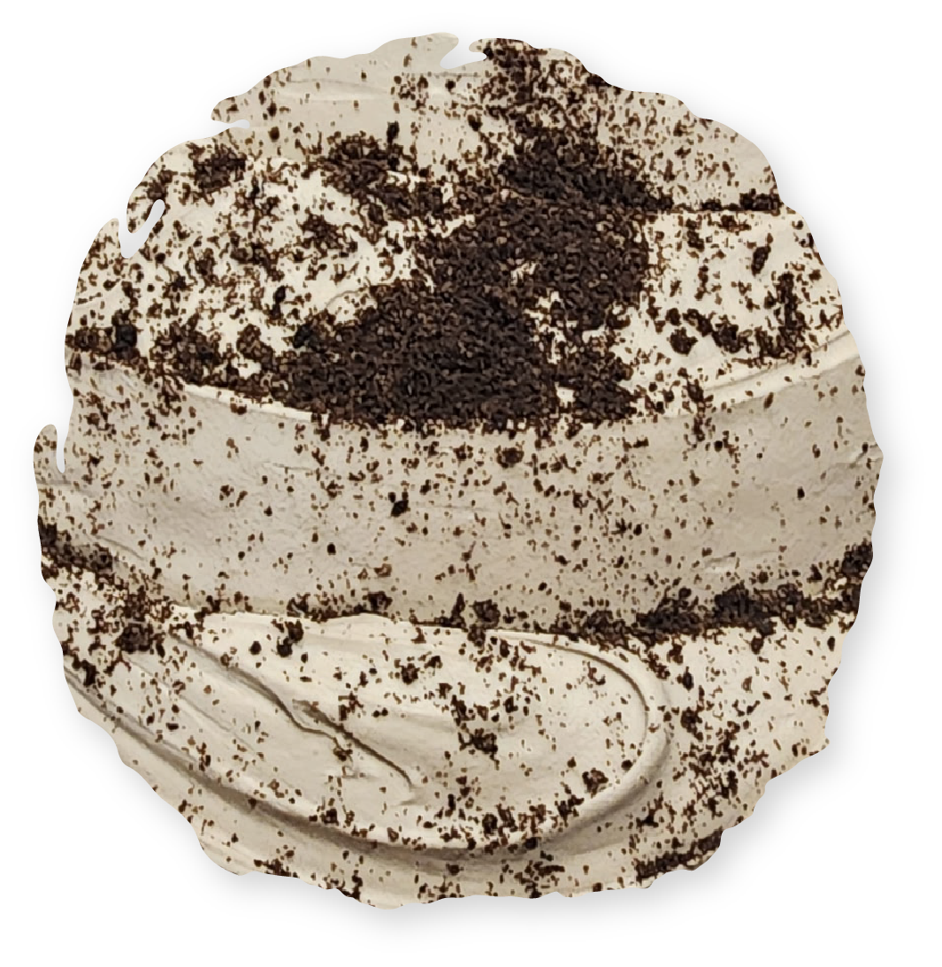 Cookies and cream frosting with dark cookie crumble on top.
